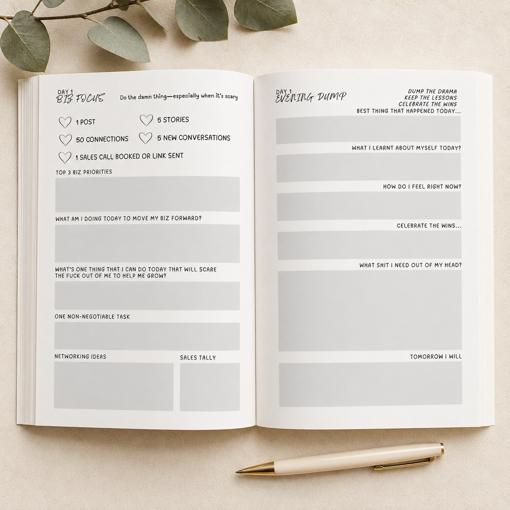 An open planner or notebook spread on a light beige surface, showing two white pages with handwritten and printed productivity/planning sections. A gold pen rests at the bottom, and green leaves are partially visible at the top edge.